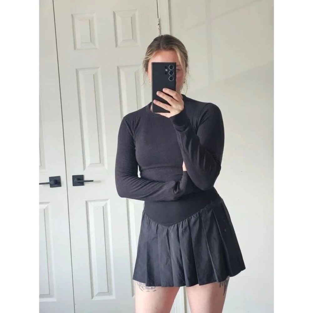 Free people movement pleated tennis skirt black small